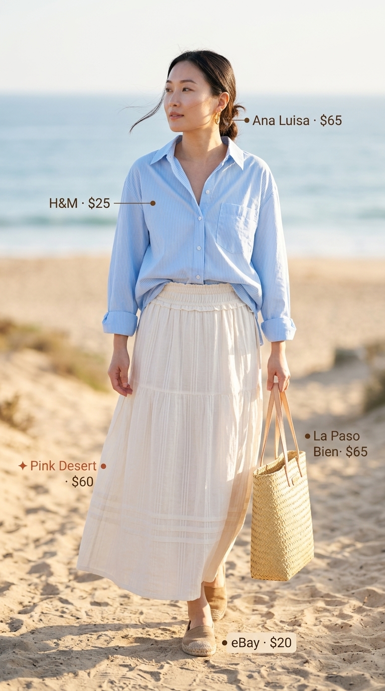 Coastal Breeze Picnic Summer Skirt Outfits for Women 2026 Coastal Breeze Picnic: White linen skirt, sky blue shirt tied at waist, tan espadrilles. Summer skirt outfits for women 2026.