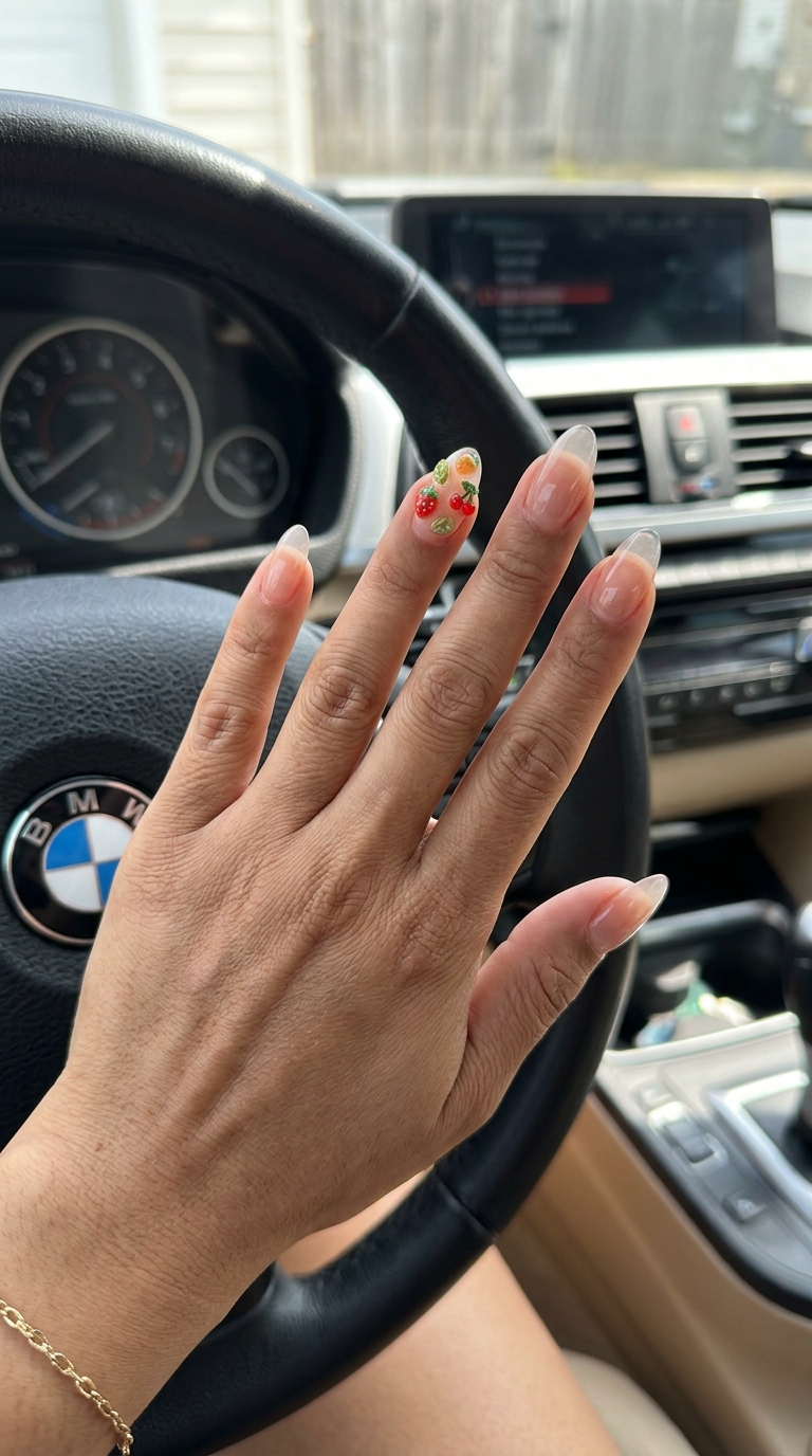 Cute summer nails 2026: Jelly Fruit Charm Vacation Accents for beach trips or pool parties. Clear jelly with fruit charms.
