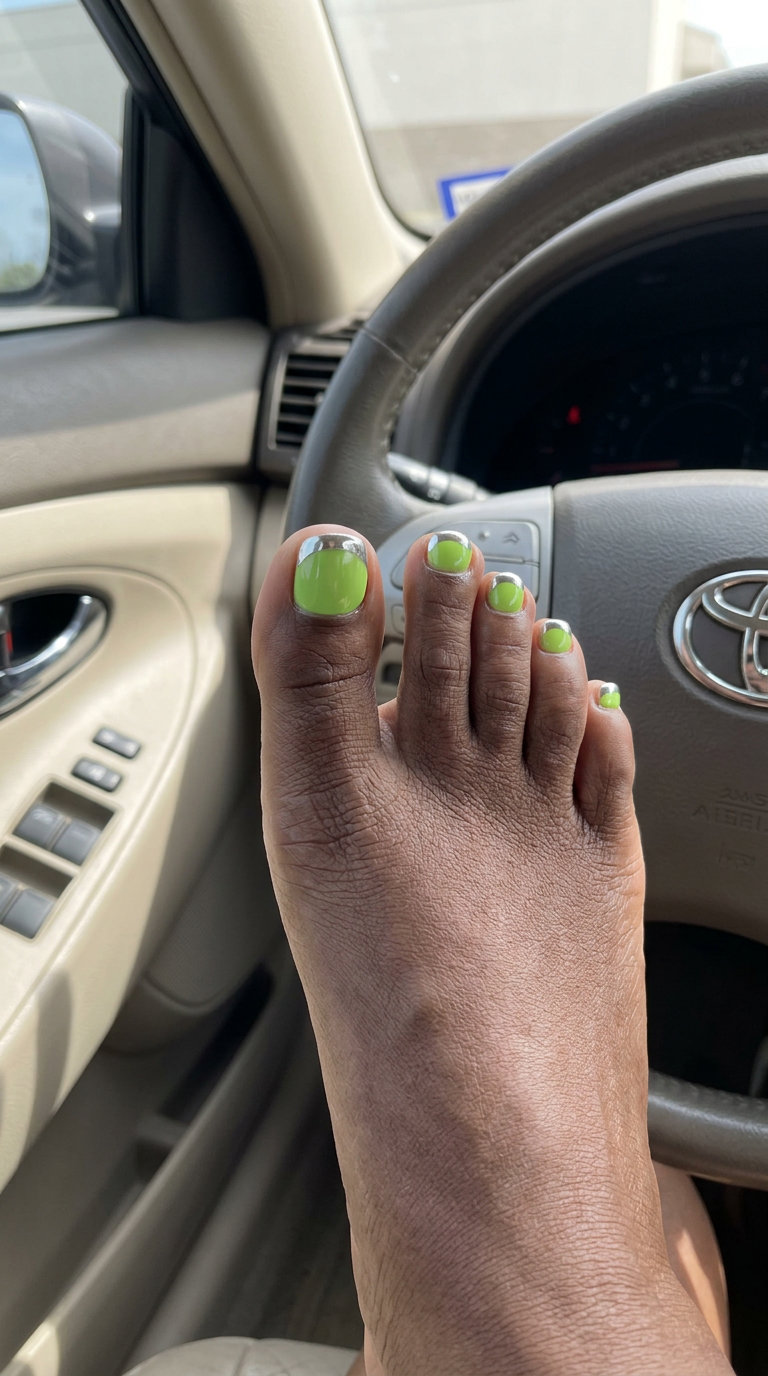 Lime Green Chrome French Tip 2026: Edgy Event Style Lime Green Chrome French Tip Pedicure for summer 2026: vibrant green with mirror silver tip. Edgy event style.
