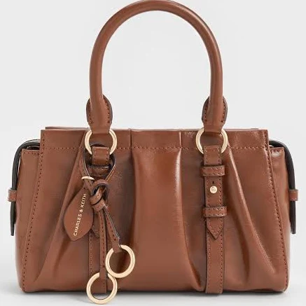 bag Charles & Keith Britton Top Handle Tote Bag charleskeith.com $106