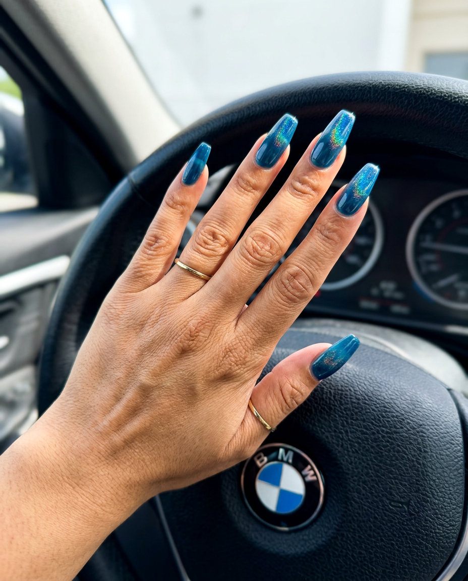 Shell Summer Nails 2026: Edgy Coffin Holographic Deep Sea Holographic Coffin nails for shell summer nails 2026. Deep oceanic blue with dazzling holographic shimmer.