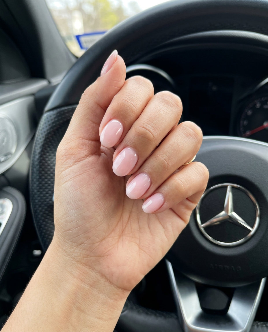 Short oval summer nails 2026 in opaque milky pink builder gel for workwear or minimalist chic.