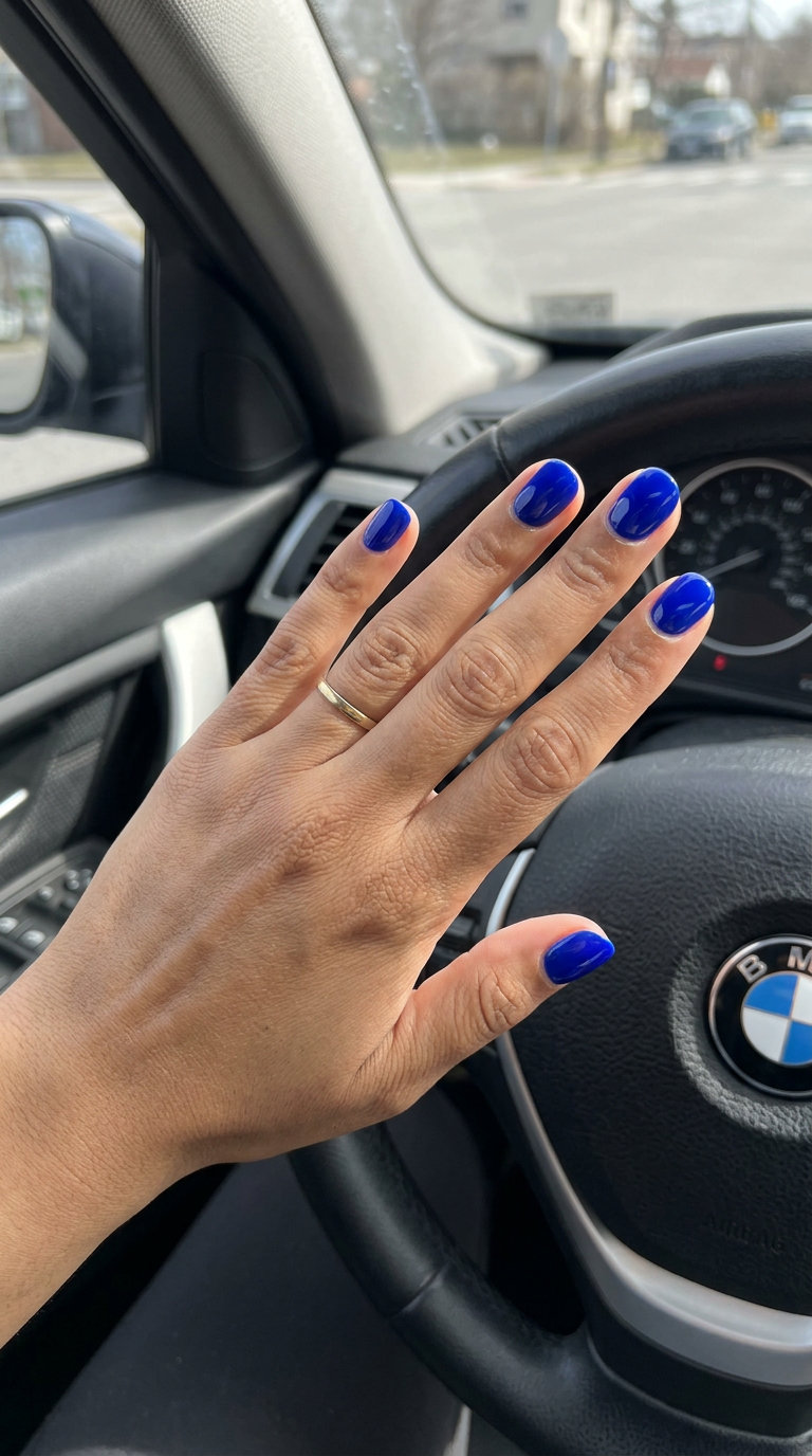 Cobalt blue glossy solid short round nails 2026 for parties and statement wear. Bold look.