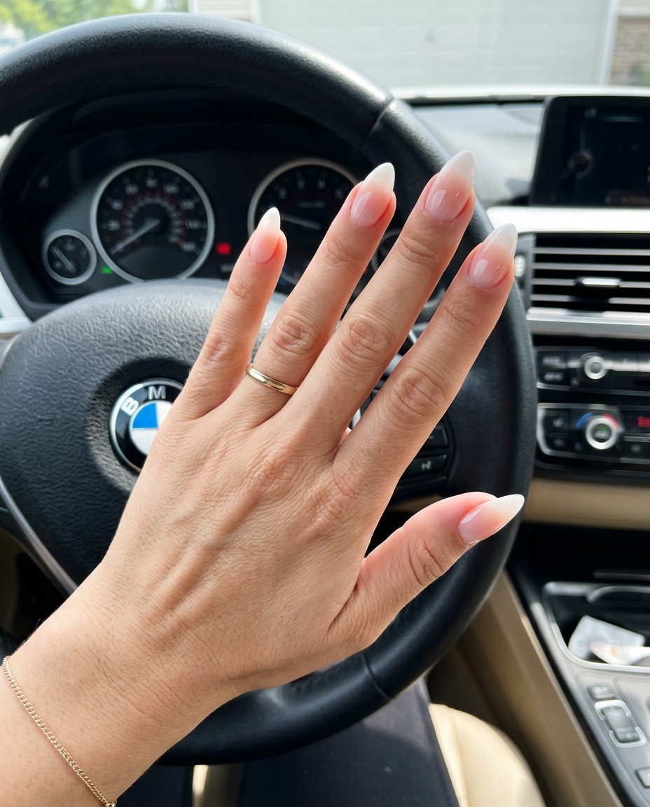 Milky white stiletto sheer ombre nails for stiletto summer nails 2026. Elegant for any occasion.
