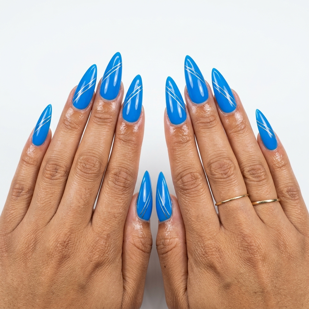 Edgy electric neon blue stiletto summer nails 2026 with futuristic silver lines for festivals.