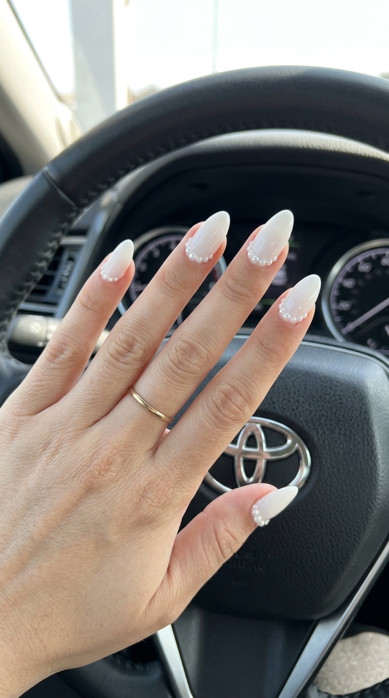 Summer Classy Nails 2026: Milky White Pearls Milky white gel nails with pearl accents for a classy summer look in 2026. Elegant bridal shower or wedding nails.