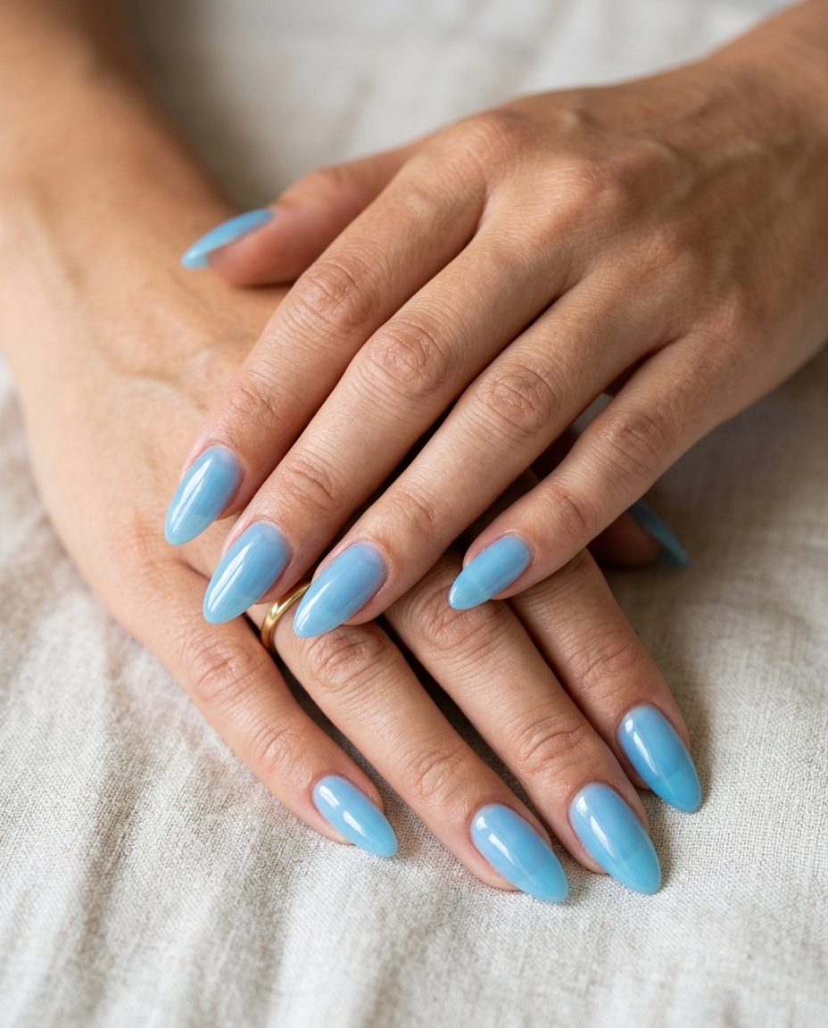 Refreshing pale blue jelly almond nails for summer classy nails 2026. Playful vacation & casual party style.