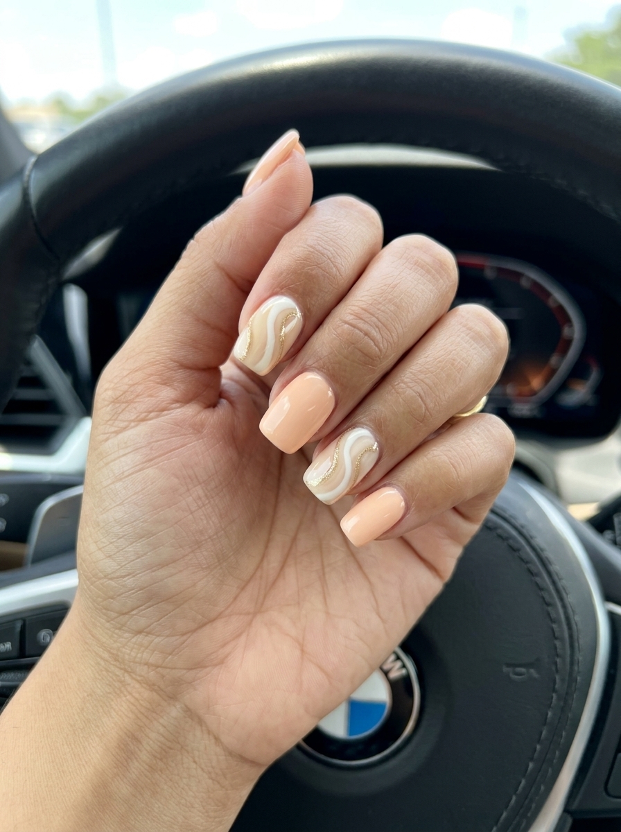 Summer Classy Nails 2026: Soft Peach Swirls Squoval Playful soft peach swirls squoval nails for summer classy nails 2026. Chic date night & festival style.