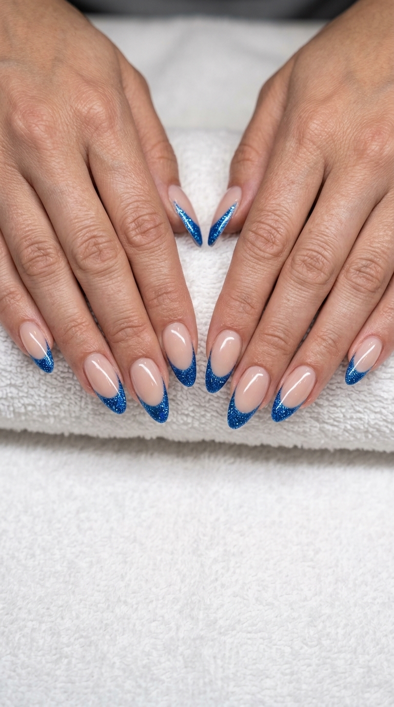 Summer colorful nails designs 2026: Sparkling electric blue French tips for festivals and parties.