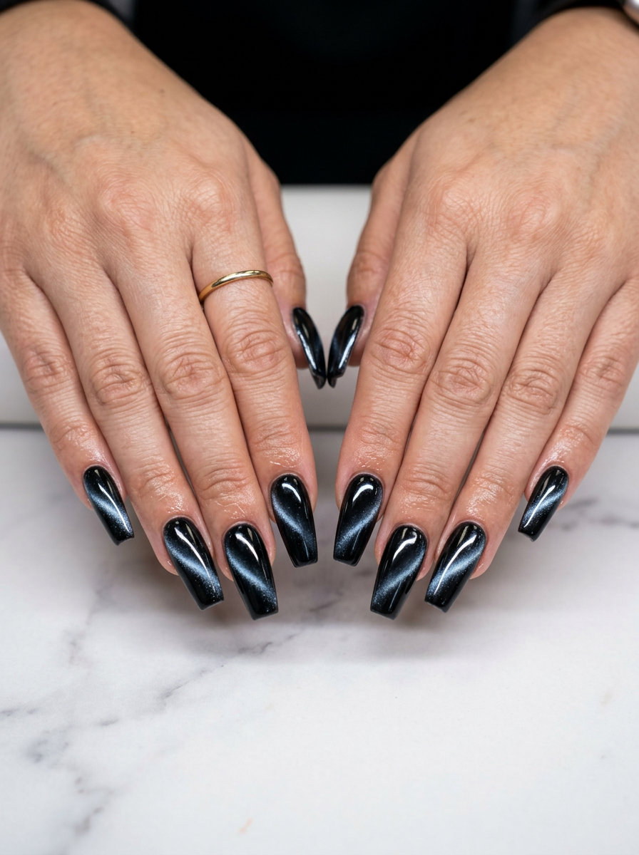 Midnight Cat Eye Summer Dip Nails 2026 Midnight cat eye coffin nails for summer dip nails 2026, ideal for date nights and parties.