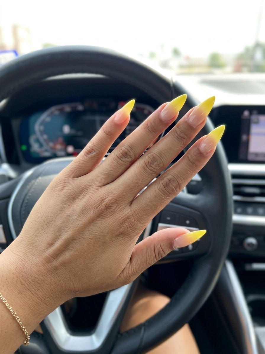 Lemon Zest Ombre Stiletto Nails 2026 Long stiletto nails with a lemon zest yellow ombre from nude, perfect for parties and nights out. Summer nails yellow 2026.
