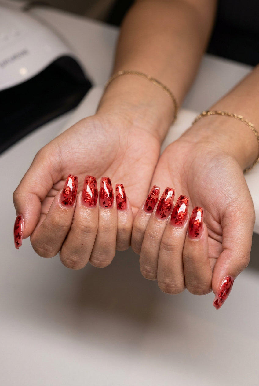 Red foil flake sparkle shattered glass nails for parties. Summer red nails 2026.