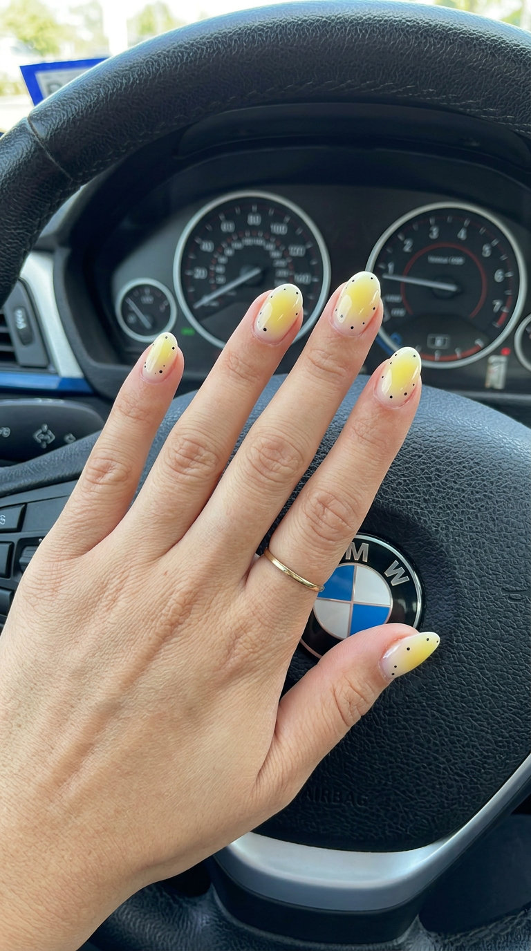 Yellow Aura Dot Nails | Summer Vibes Nails 2026 Playful yellow gradient oval nails with black dot accents for summer vibes nails 2026.