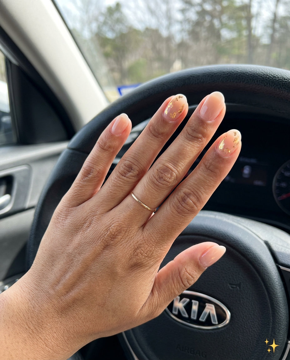 Gilded Nude Elegance builder gel nails for summer wedding nails 2026. Sophisticated sheer nude with gold foil.