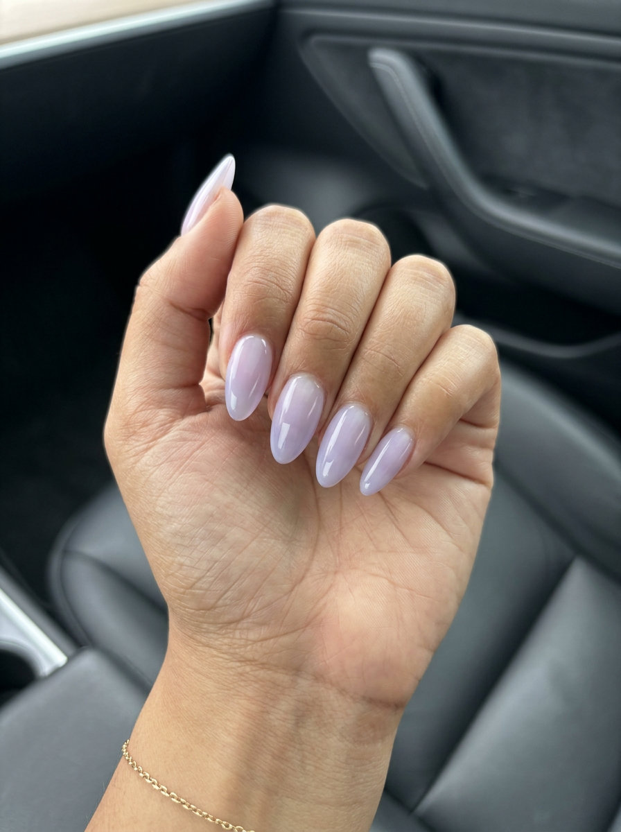 Gradient Lavender Haze nails for summer wedding 2026. Dreamy and romantic with milky white to lavender.