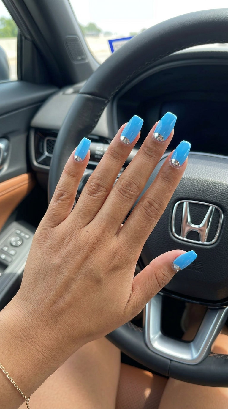 Celestial Sky Blue Nails 2026 | Chic Everyday Sky blue jelly half-moon chrome nails for chic daily wear. Trendy summer nails 2026.