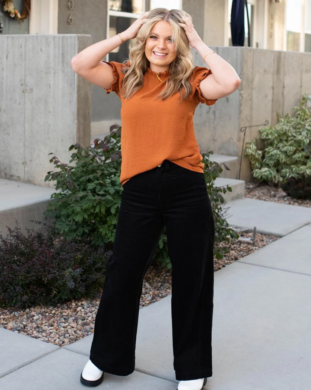 all pants outfits for women 2026 Rust Tones and Black Wide-Leg Pants for Everyday Fall Style