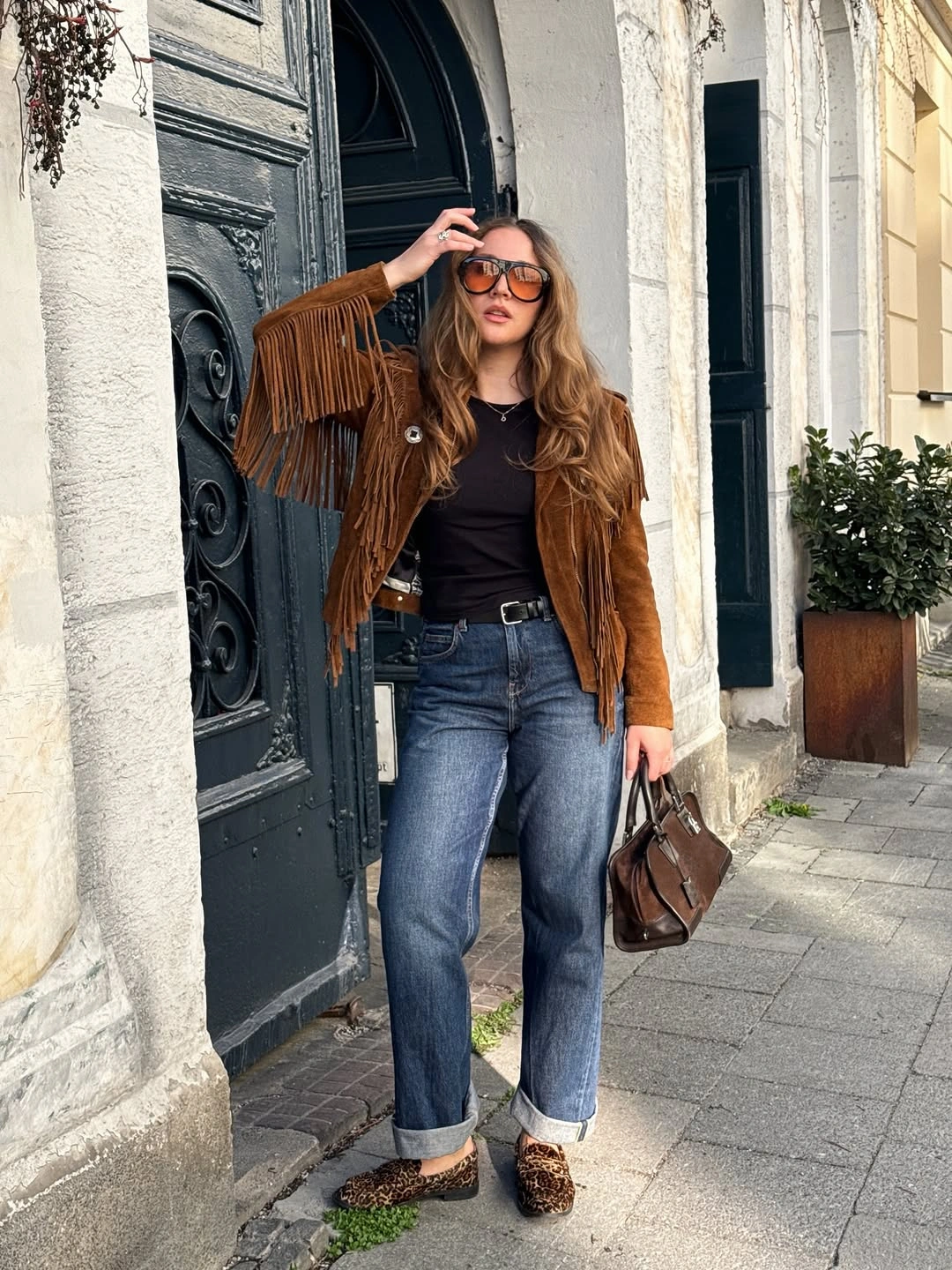 boho chic fall outfits 2026 Western Fringe Layers with Relaxed Denim
