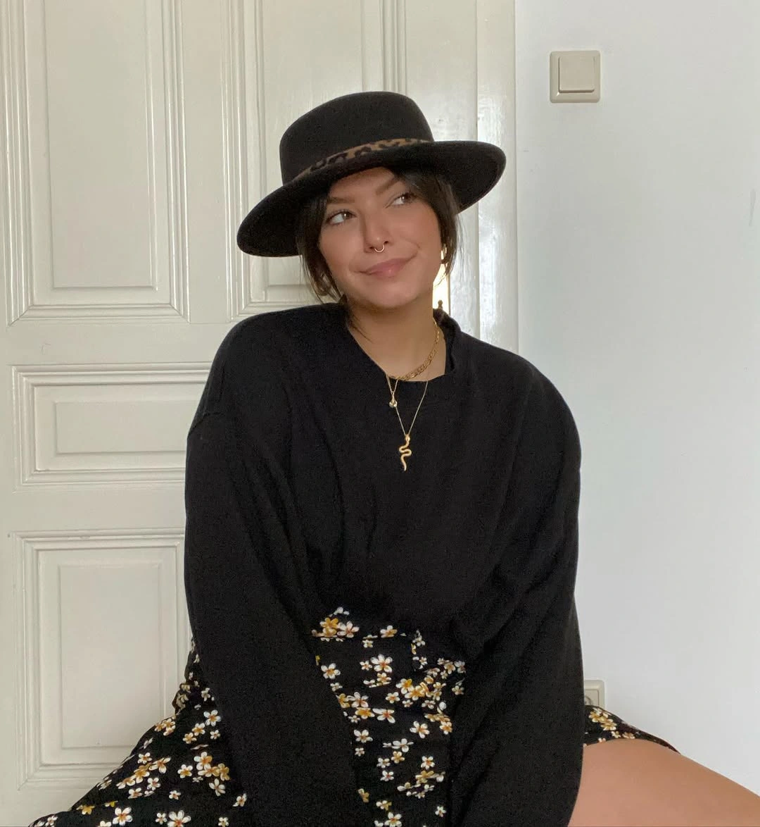 boho chic fall outfits 2026 Minimal Boho with Dark Florals and a Classic Hat