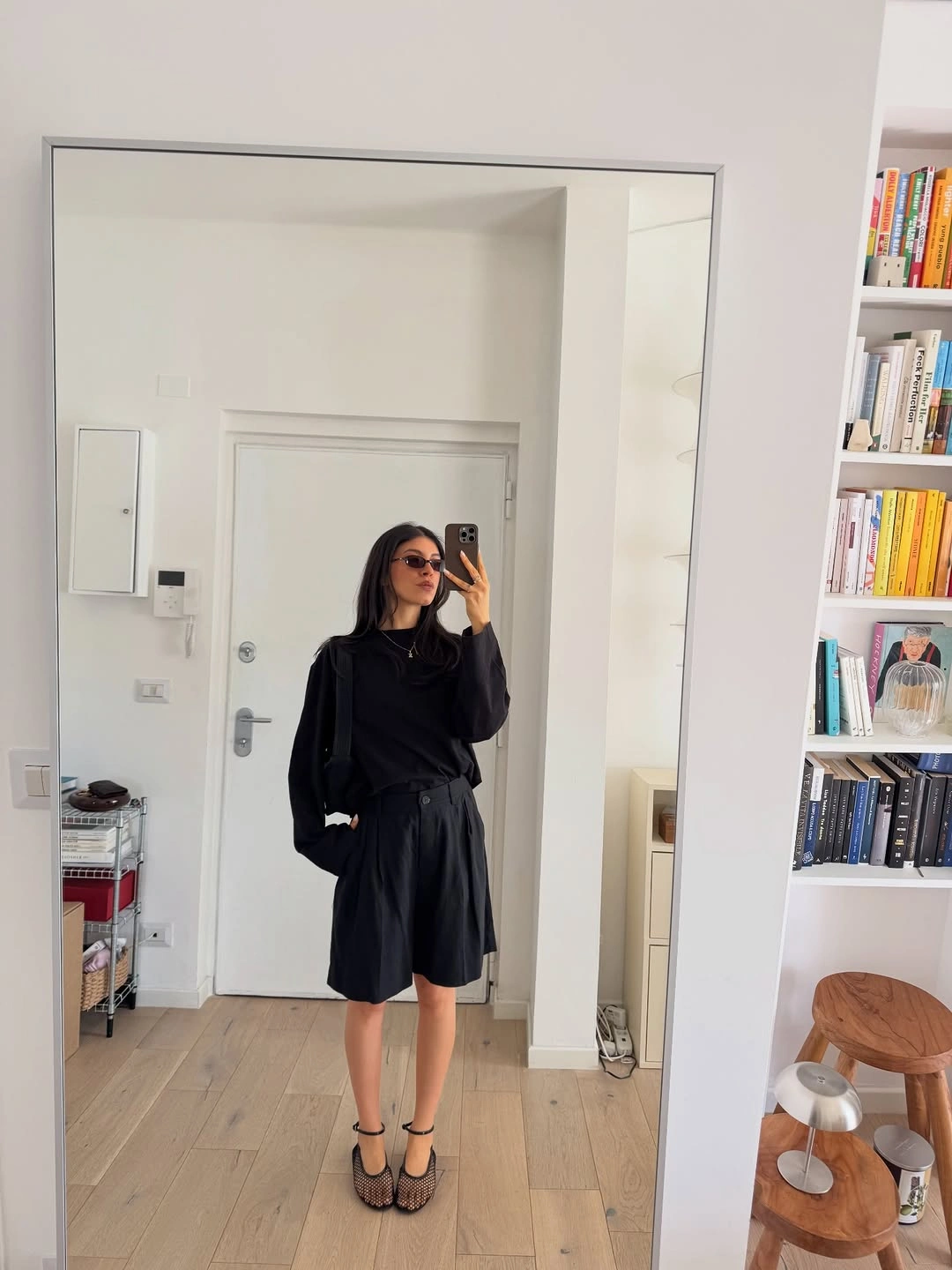 early fall outfits 2026 Minimalist Black Tailoring With Modern Bermuda Shorts
