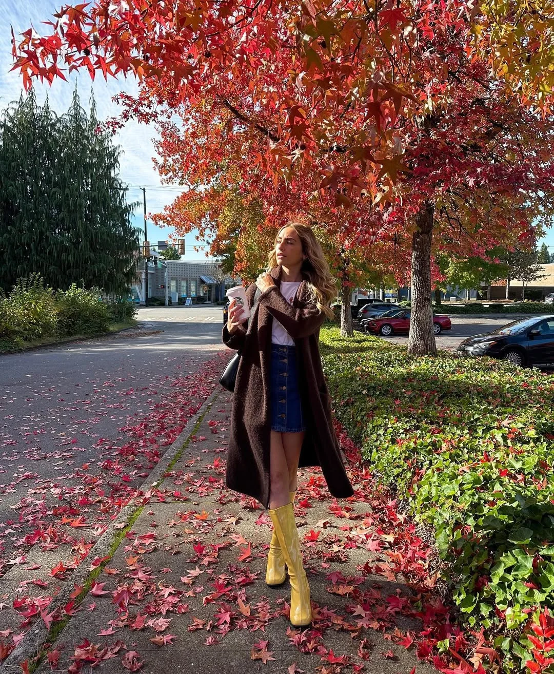 Early fall outfits ideas 2026 Mini Skirts And Tall Boots For Peak Autumn Energy