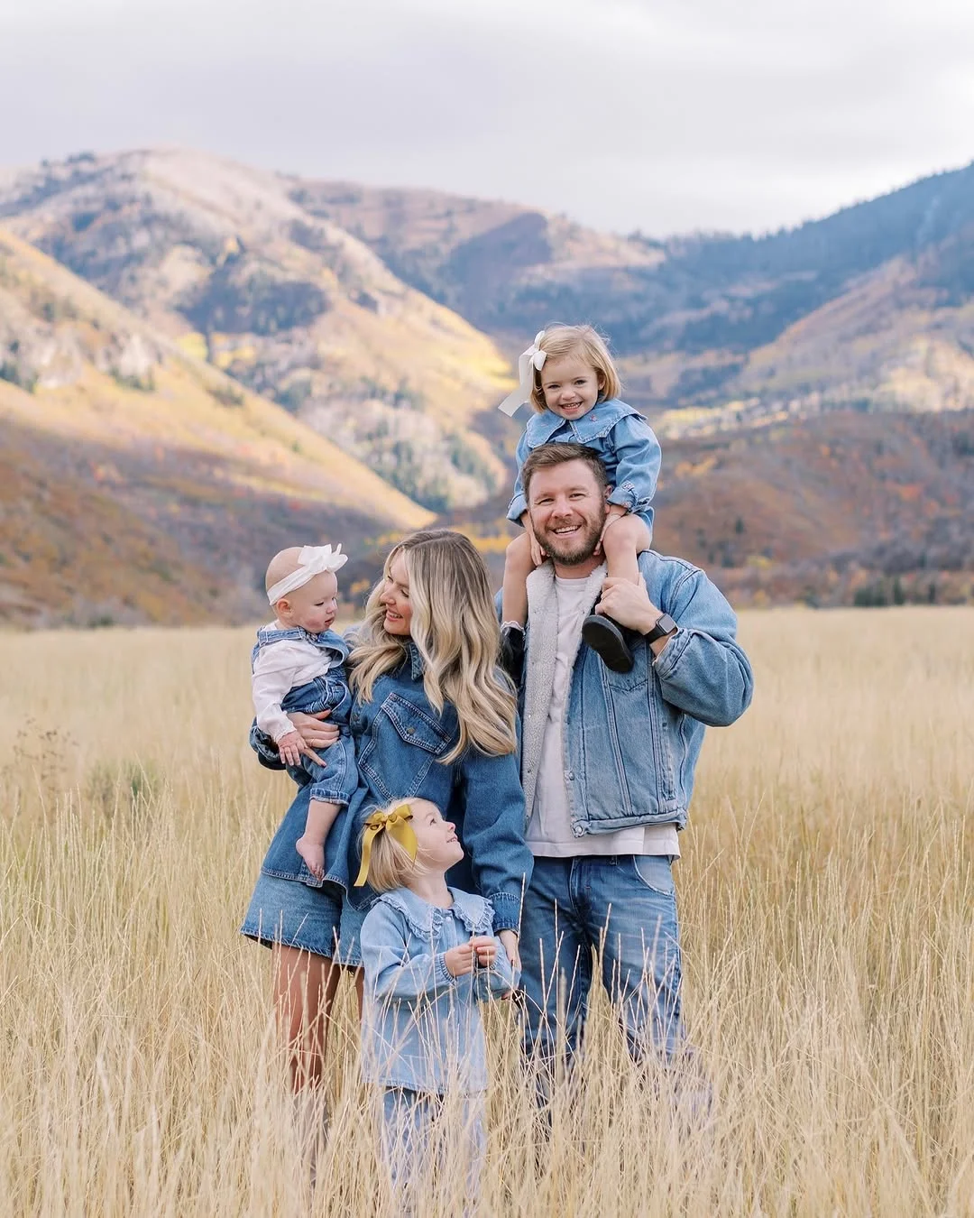 fall family picture outfits 2026 All Denim Family Styling for a Modern Mountain Session