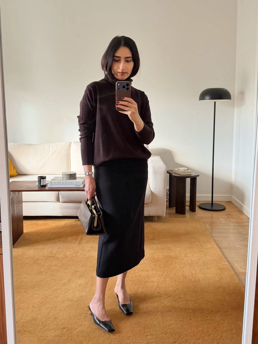 fall going out outfits 2026 Minimal Knitwear and a Satin Skirt for Effortless Evening Elegance