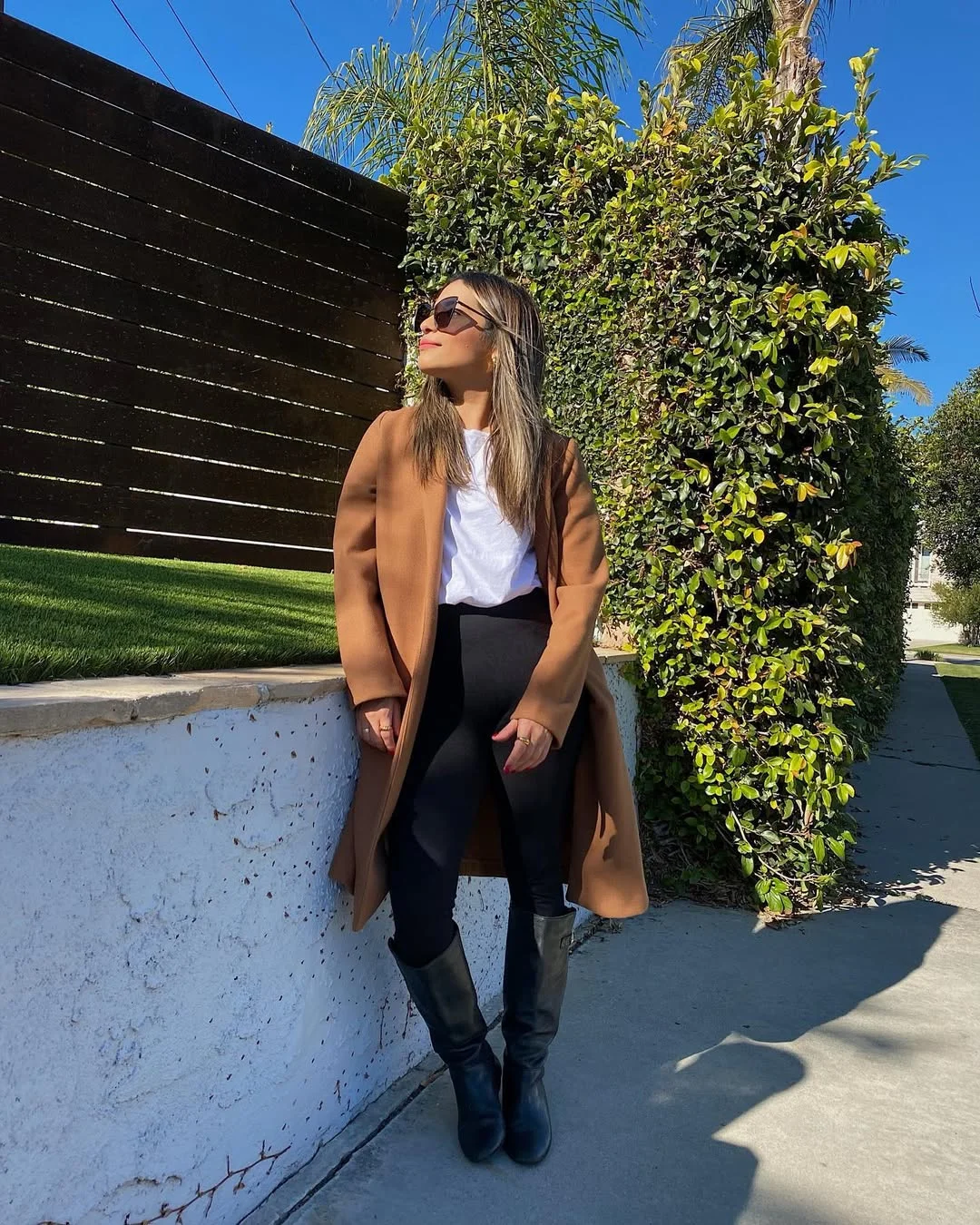 fall outfits for women in 30s style 2026 The Timeless Camel Coat and Black Boots Combination