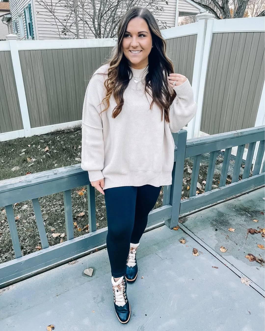 fall outfits with leggings and boots 2026 Cozy Knit Sweater with Everyday Lace-Up Boots