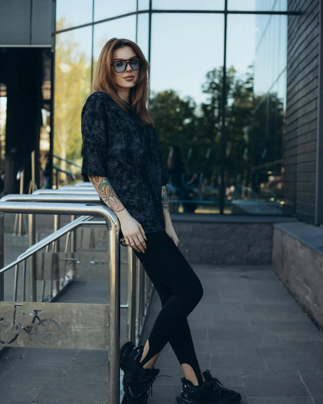 fall outfits with leggings and boots 2026 Relaxed Street Style with Leggings and Athletic Boots