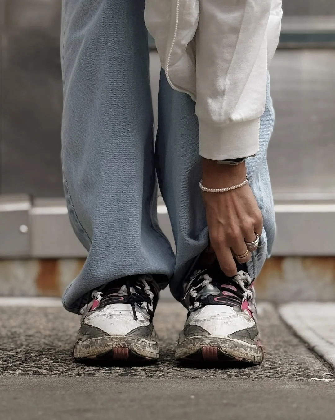 fall outfits with sneakers and jeans 2026 The Worn-In Sneaker Trend That Defines 2026
