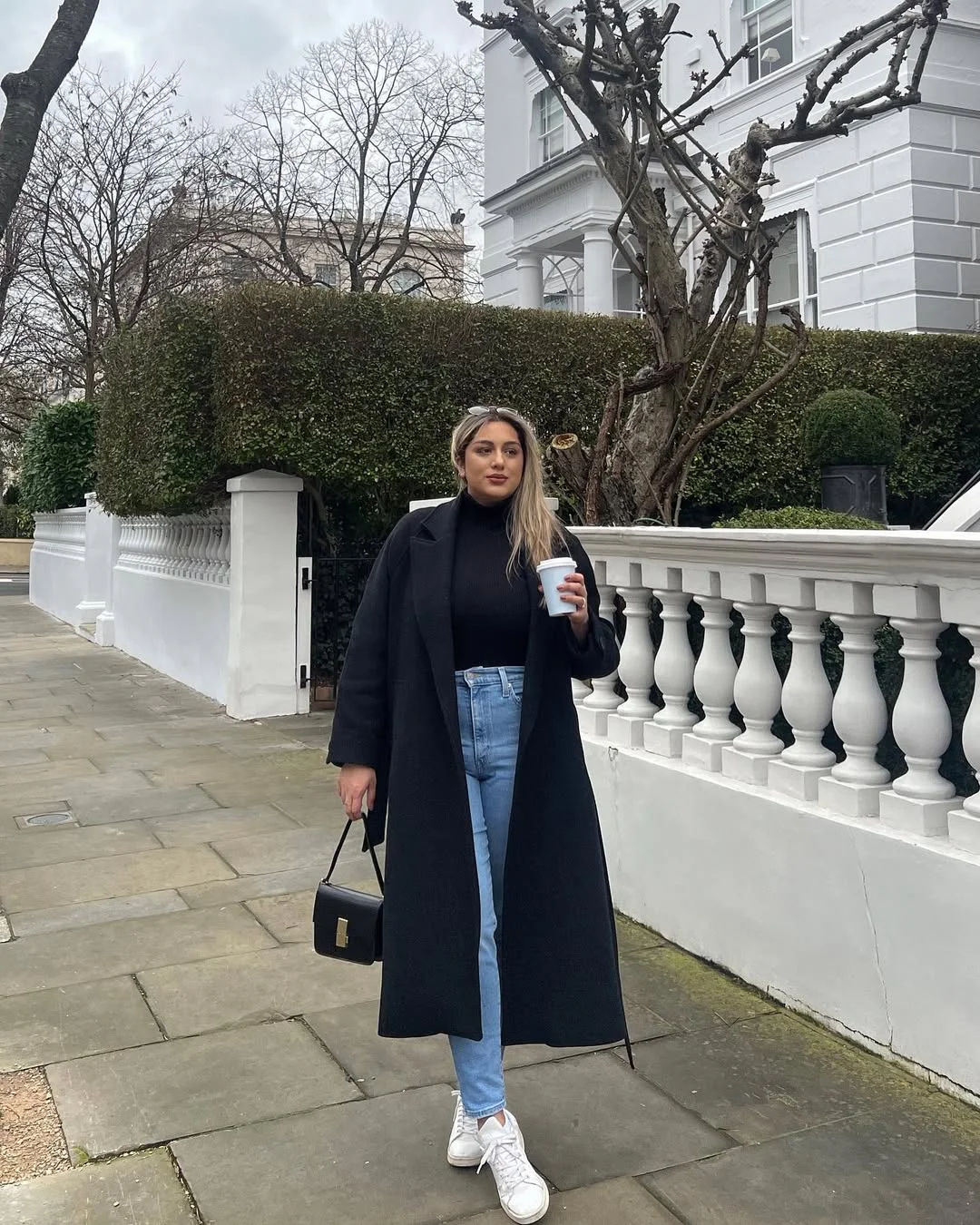 fall outfits with sneakers and jeans 2026 Classic Black Coat and White Sneakers Never Fail