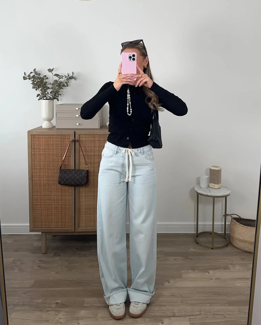 fall outfits with sneakers and jeans 2026 The Relaxed Wide-Leg Denim Trend Continues Strong
