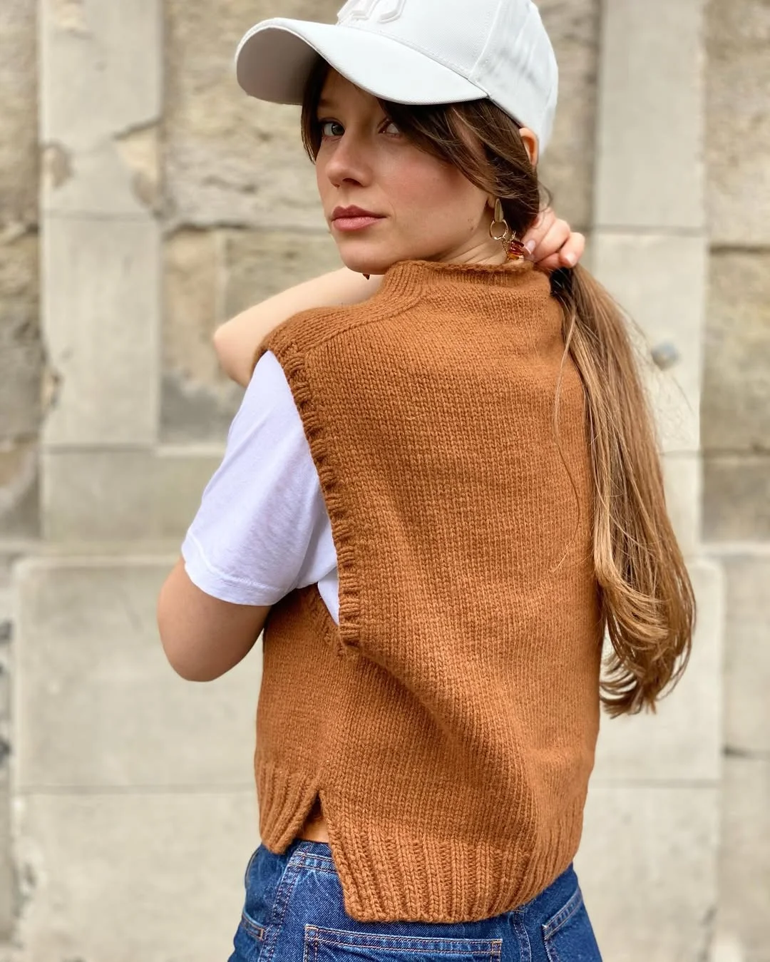 fall outfits with vests 2026 The Casual Knit Vest That Works With Every Weekend Outfit