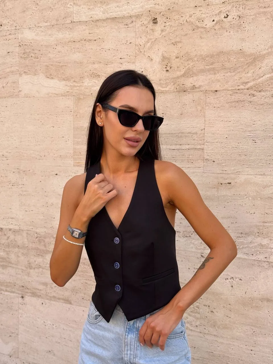 fall outfits with vests 2026 The Classic Black Vest That Makes Jeans Look Instantly Polished
