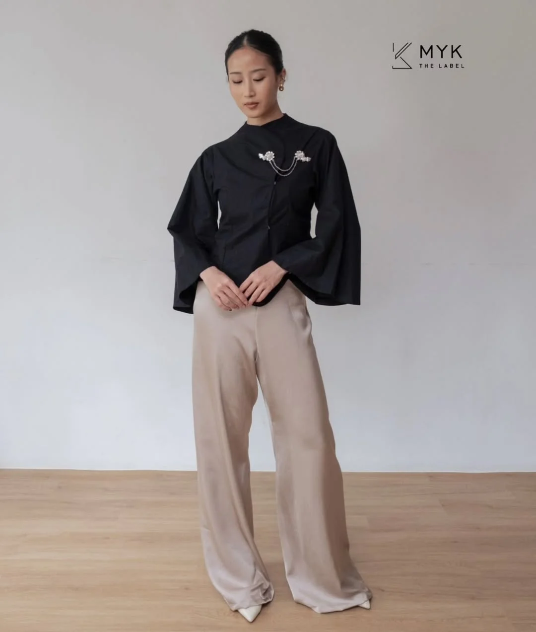 fall smart casual work outfit for women 2026 Minimal Neutral Trousers With Elegant Structured Sleeves