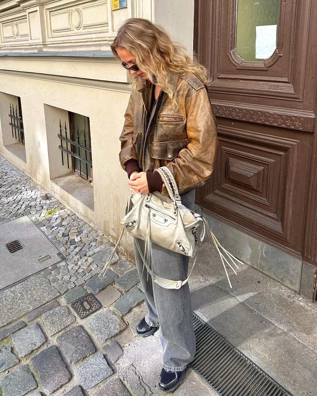 fall travel outfits 2026 Vintage Leather Layers with Modern Street Style