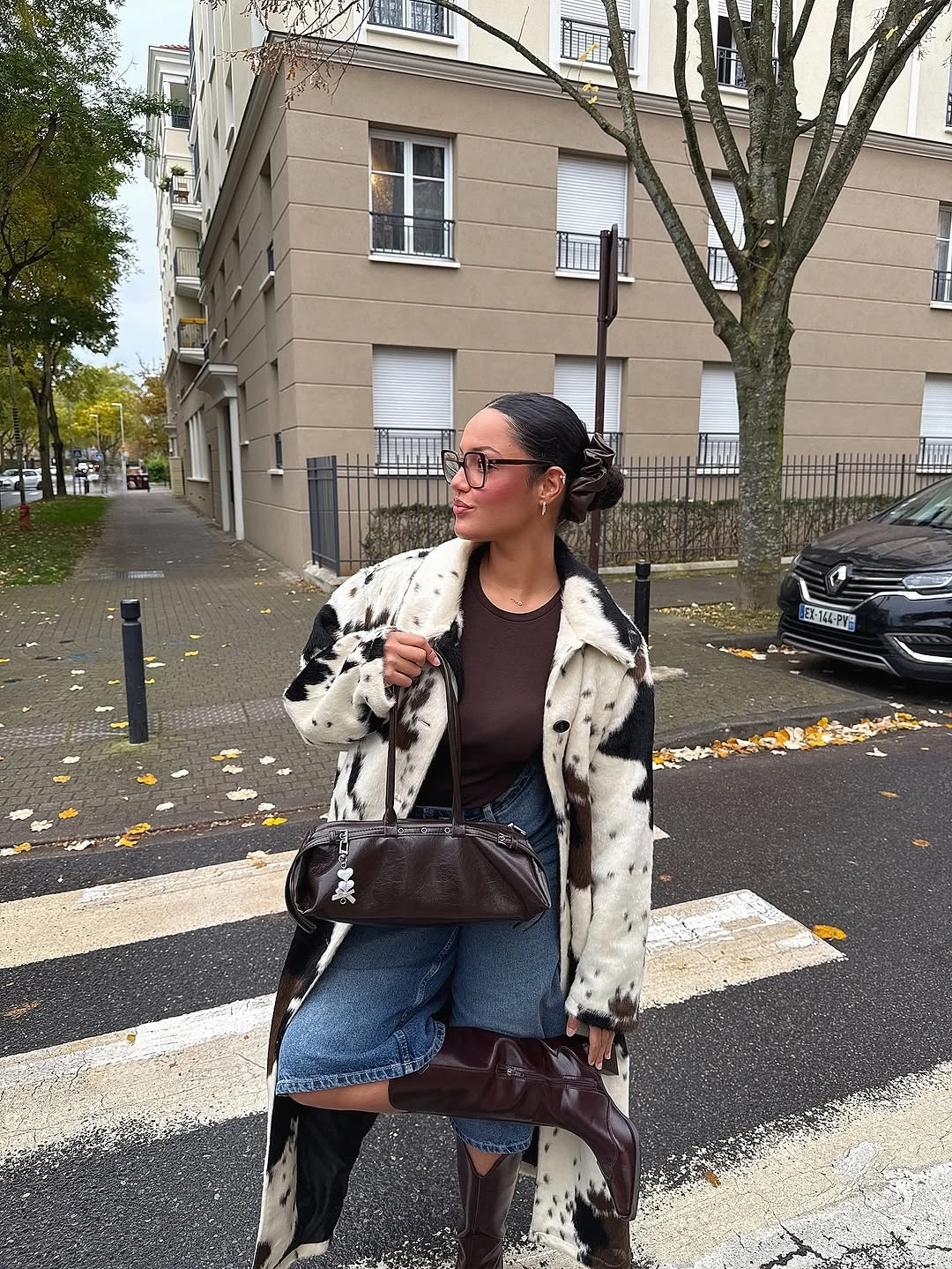 nice fall outfits 2026 Animal Print Coat With a Denim Midi Skirt