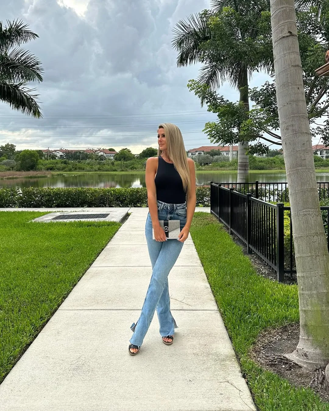 summer to fall outfits 2026 The Black Bodysuit and Split-Hem Jeans Formula That Always Works