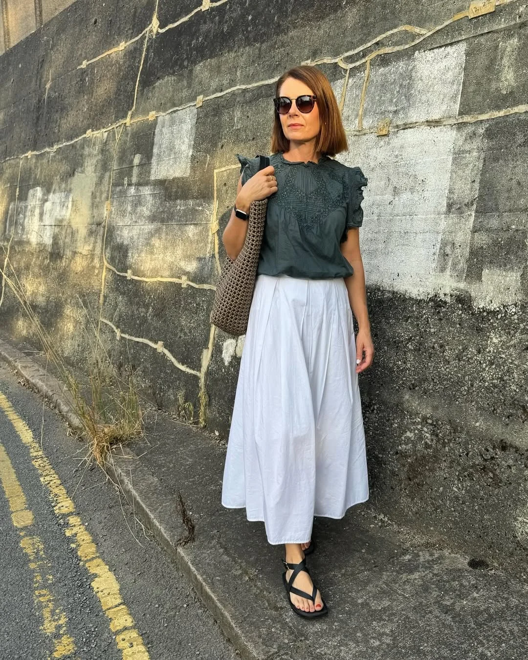 summer to fall outfits 2026 The Flowy White Skirt Outfit That Makes Early Fall Feel Effortlessly Elegant