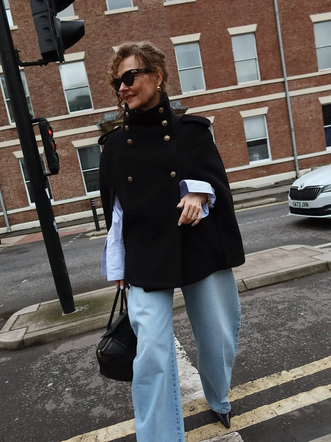 what to wear in fall 2026 over 50 The Chic Cape Trend That Instantly Elevates Everyday Denim