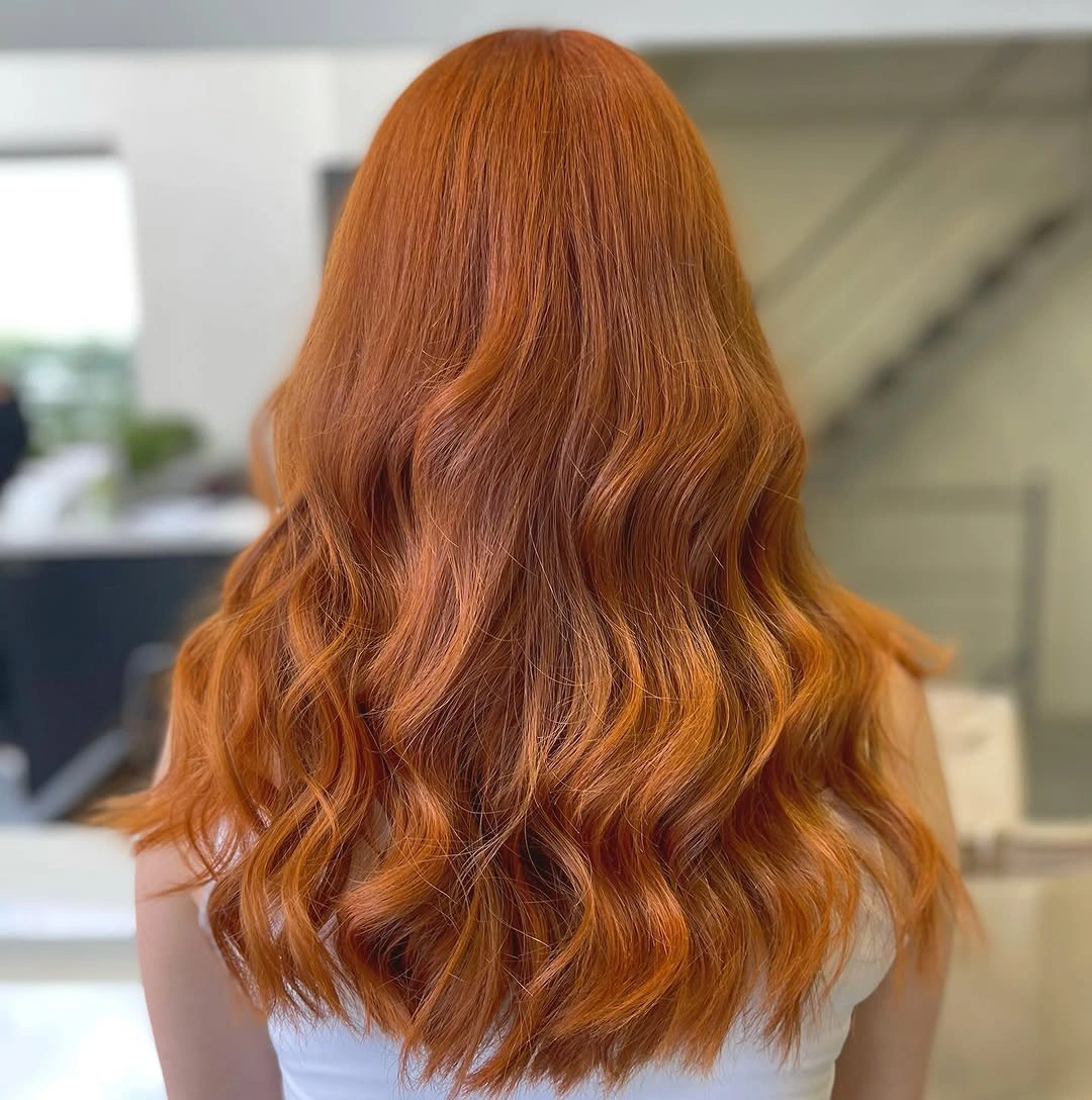 august hairstyles and color ideas 2026 Rich Cinnamon Copper Waves That Glow in August