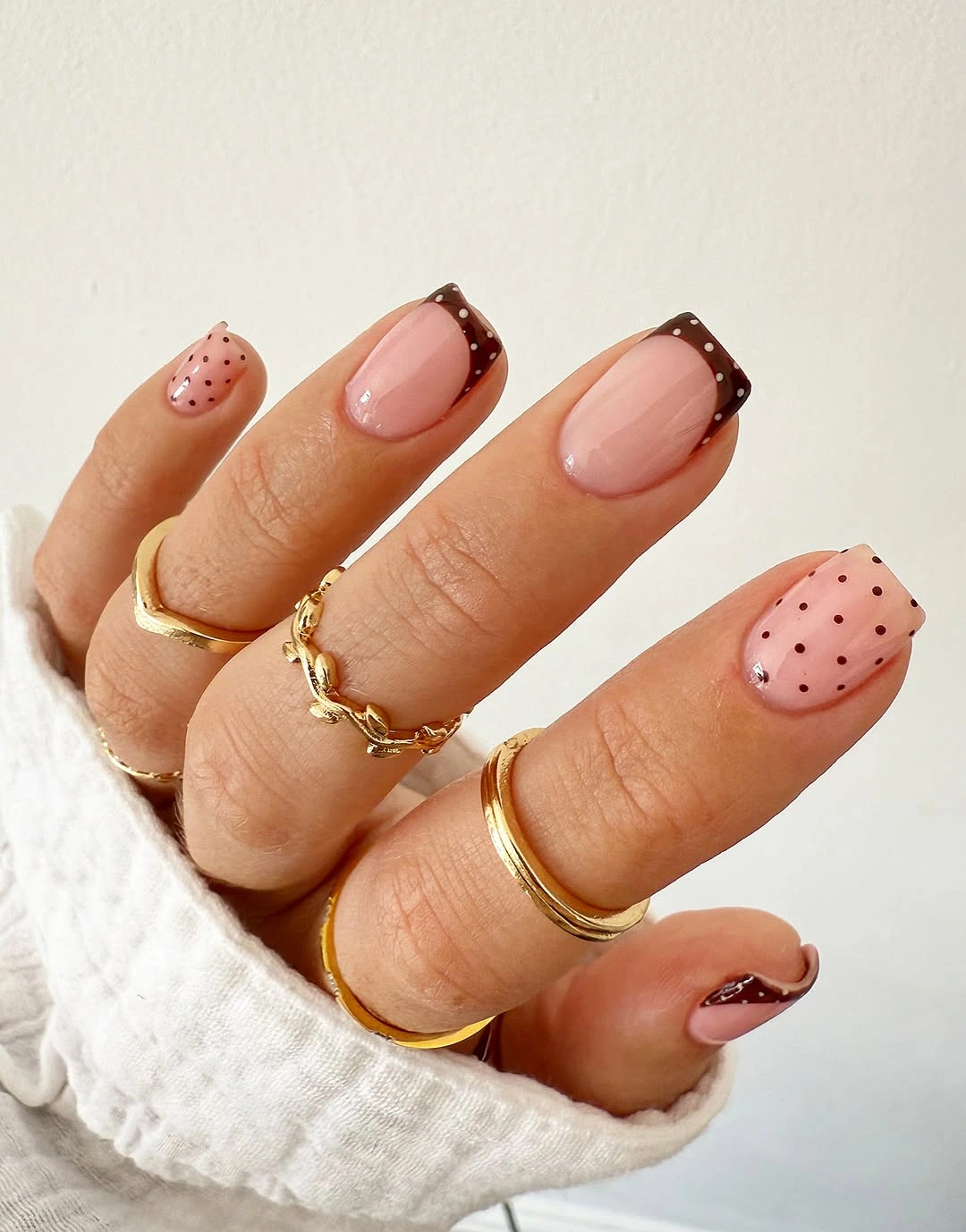 august nails color 2026 Chocolate French Tips with Delicate Polka Dots