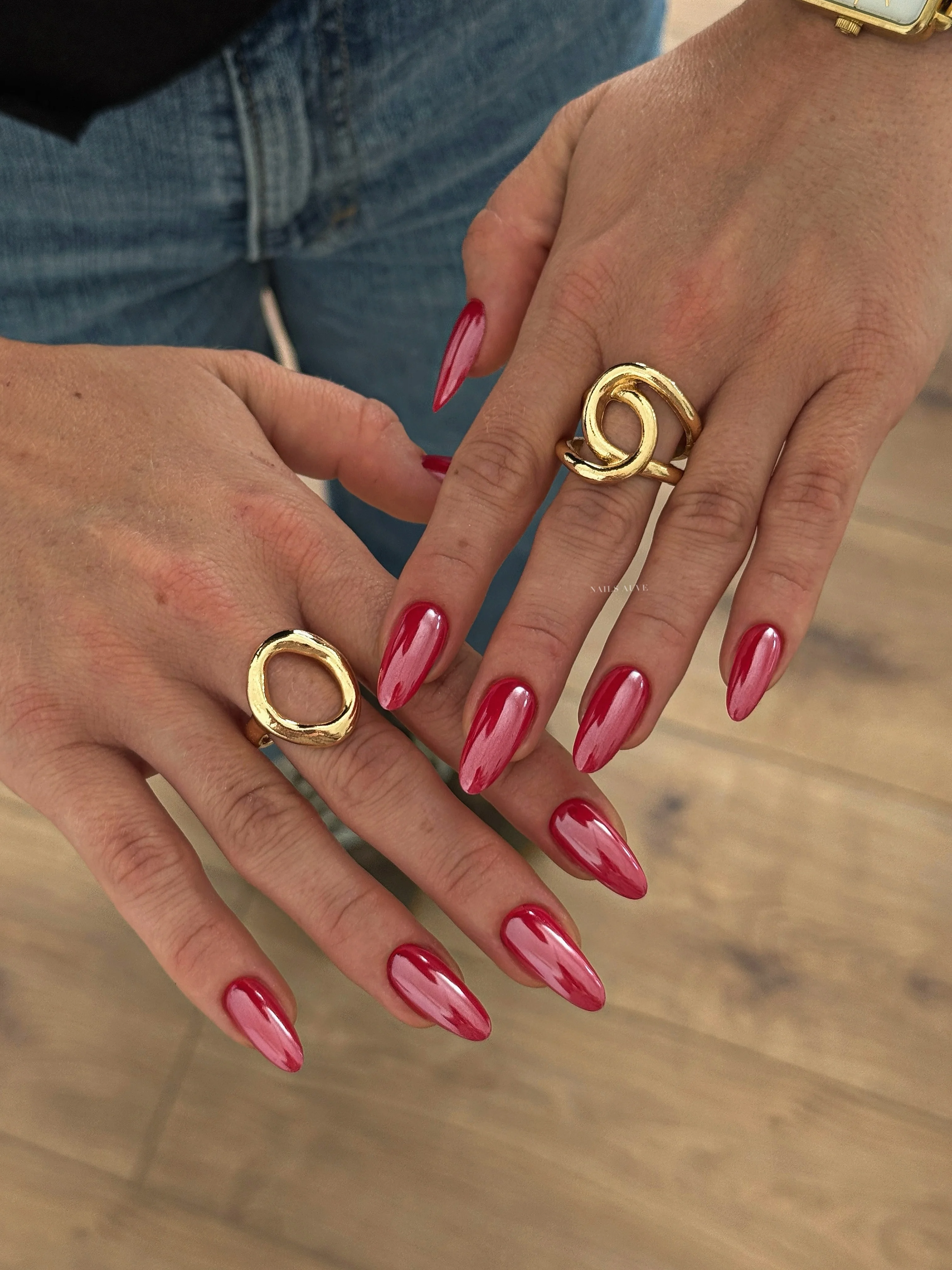august nails color 2026 Glossy Cranberry Red for Timeless Sophistication