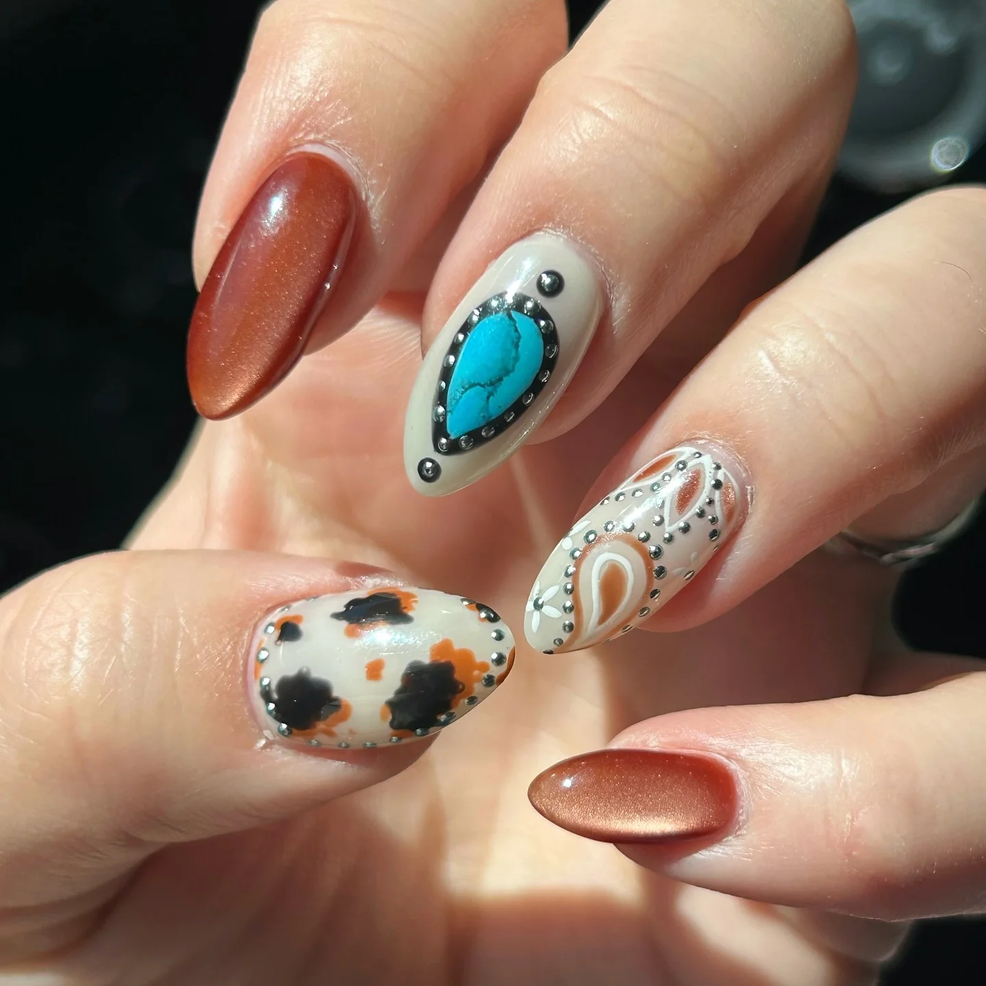 august nails color 2026 Southwestern Turquoise Nails with Rustic Bronze Accents
