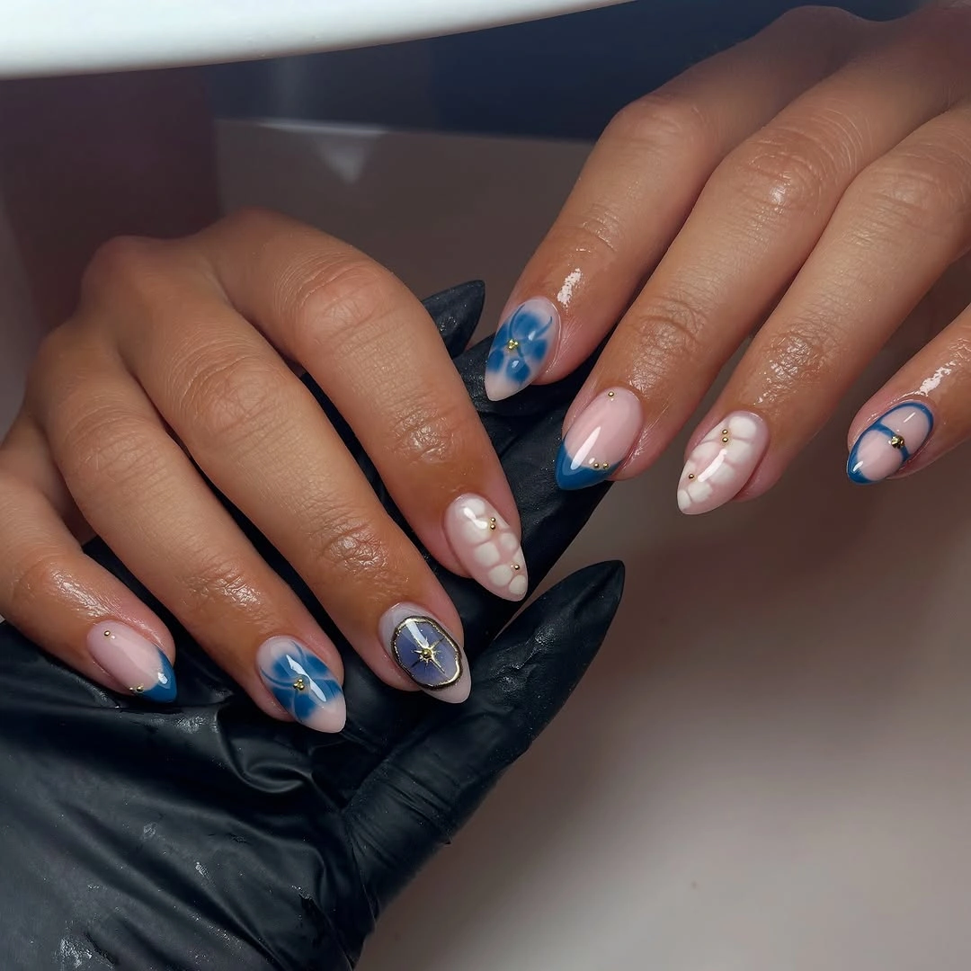 august nails color 2026 Soft Blue Floral Nails with Elegant Botanical Details