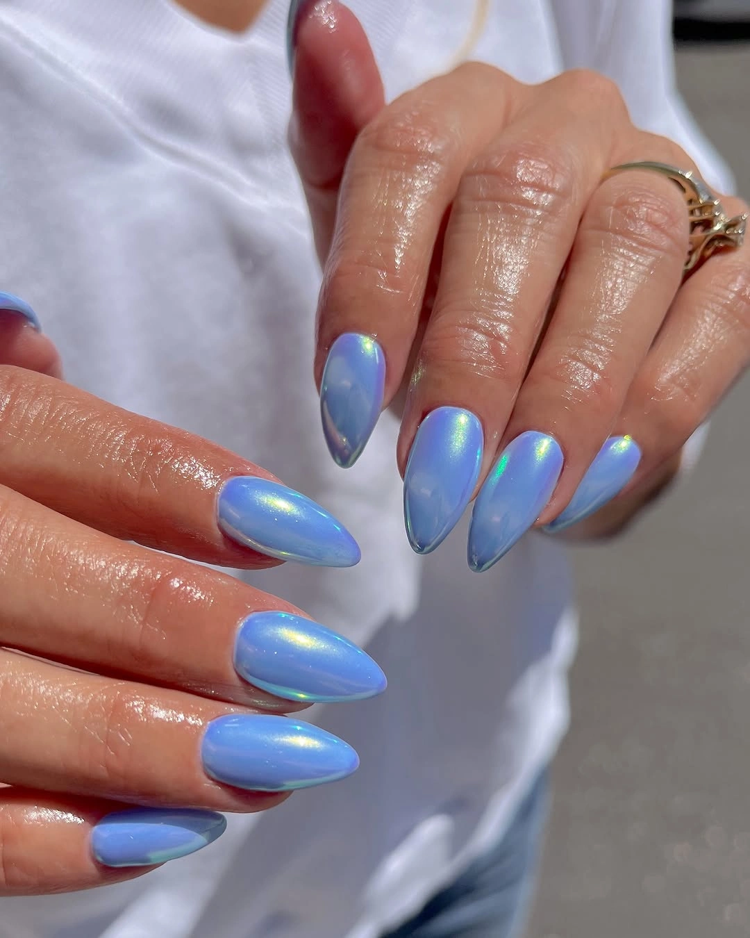august nails ideas 2026 Dreamy Periwinkle Chrome with an Iridescent Glow