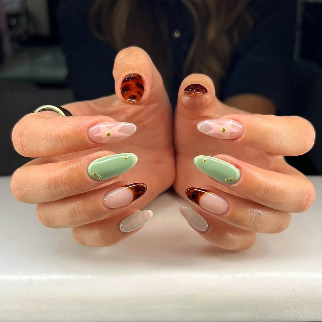 august nails ideas 2026 Modern Mixed Manicure with Sage Green and Tortoiseshell Details