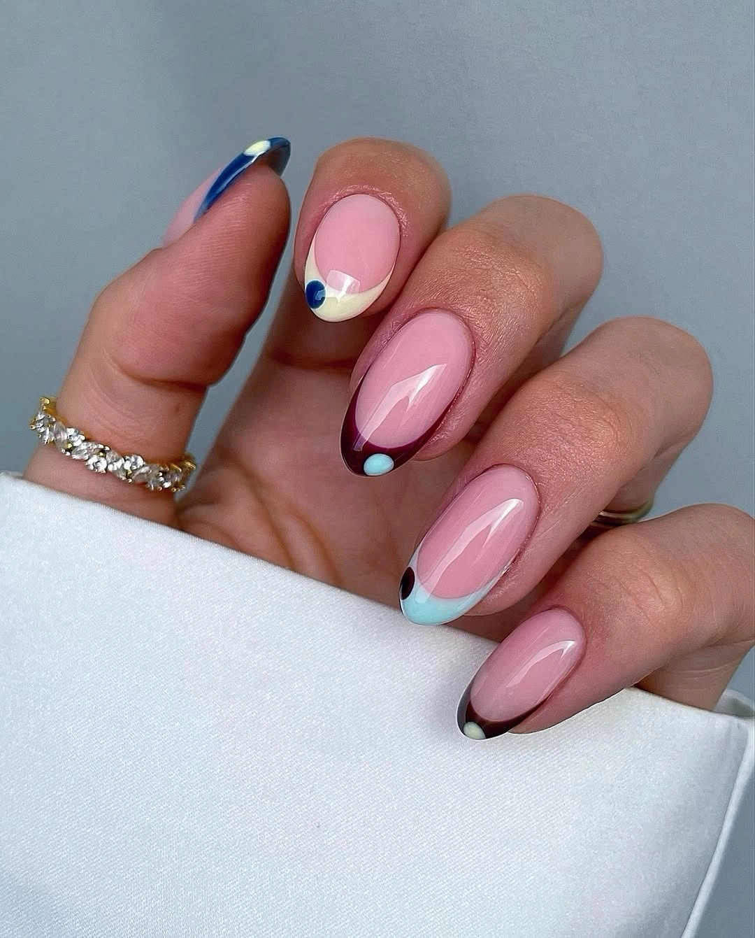 august nails ideas 2026 Minimalist Graphic French with Soft Blue Details