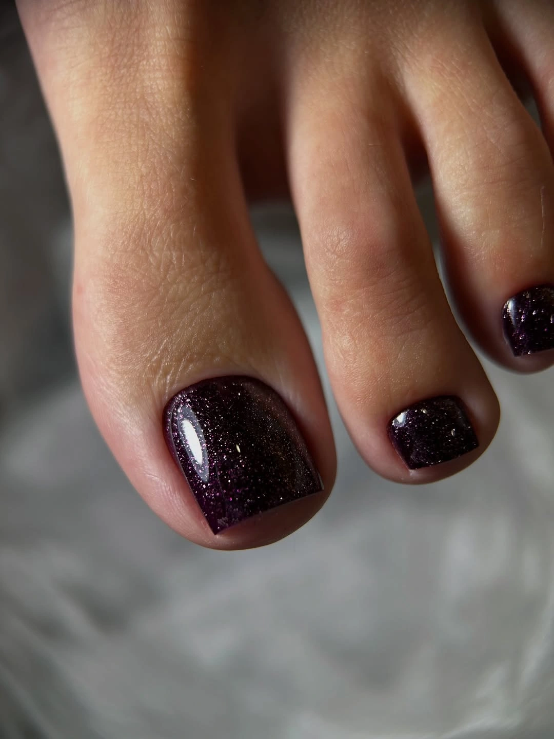 august pedicure nails ideas 2026 Deep Plum Shimmer for August Evenings